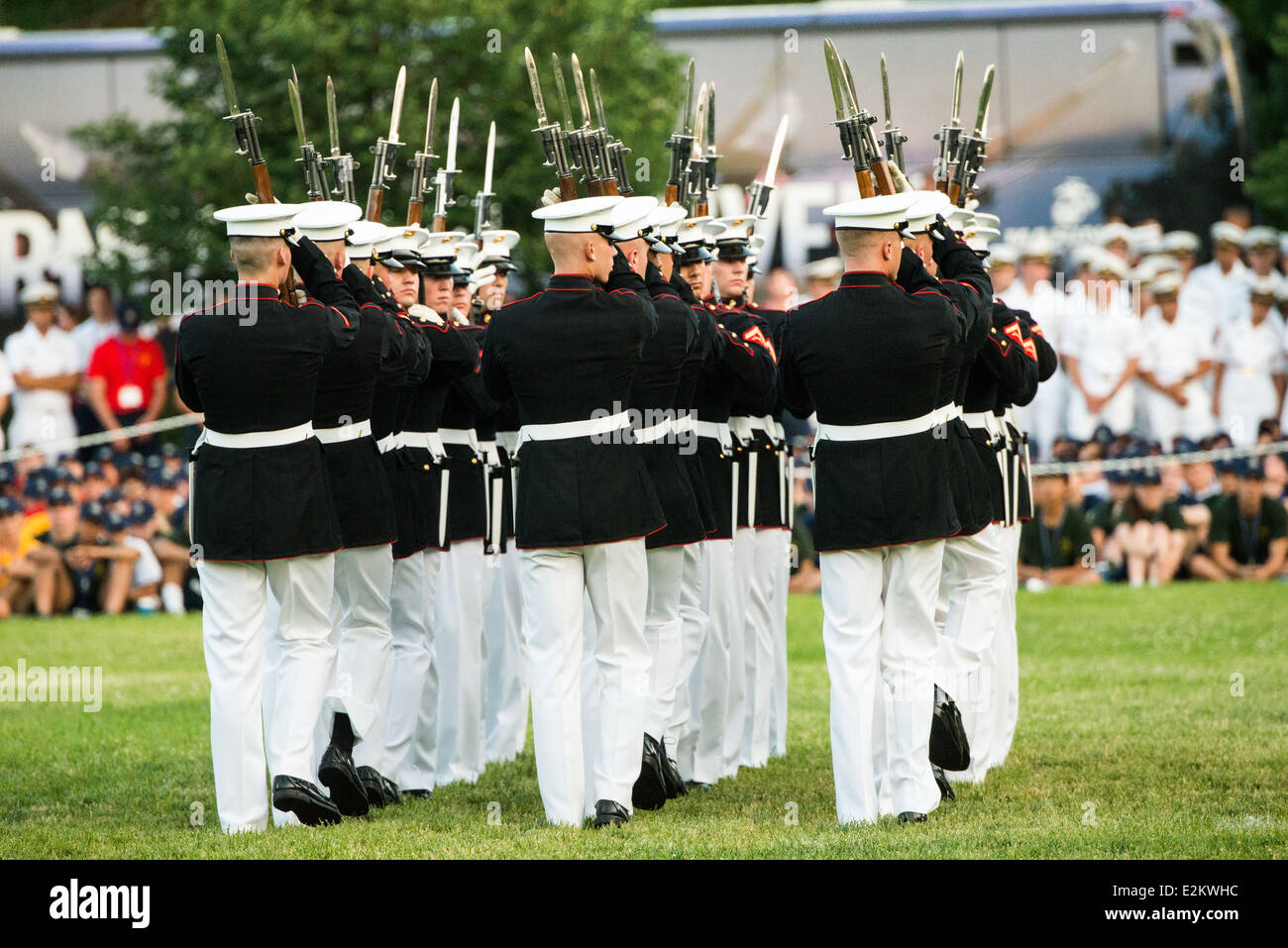 WASHINGTON DC, United States — The Silent Drill Team, an elite group of United States Marine Corps members, performs a breathtaking, meticulously choreographed routine, showcasing their discipline, precision, and skill at the Sunset Parade at the Iwo Jima Memorial in Arlington, Virginia. Stock Photo