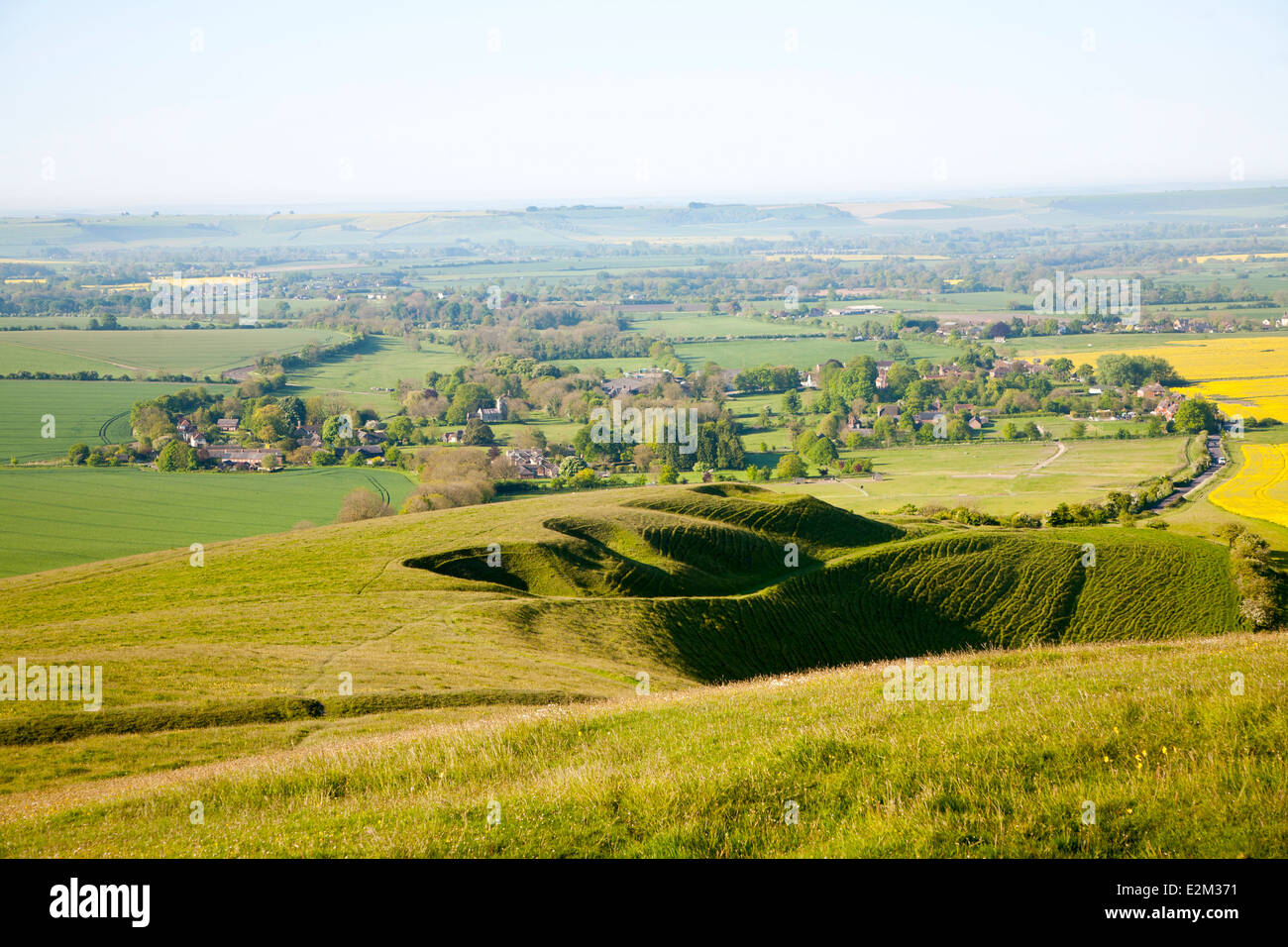 View over vale from chalk scarp slope of milk hill hires stock