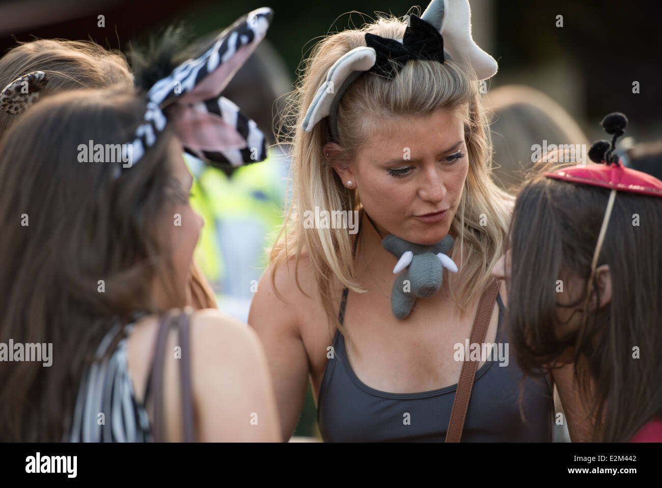 London Zoo June 2014 evening event. Women wearing animal headbands and hats. Stock Photo
