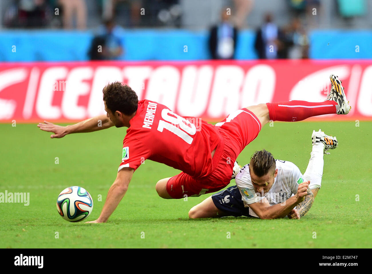 Arena Fonte Nova, Salvador. 20th June, 2014. Brazil. World Cup football, group stages. Switzerland versus France. Mathieu Debuchy (Fra) takes down Admir MEHMEDI (Sui) Credit:  Action Plus Sports/Alamy Live News Stock Photo