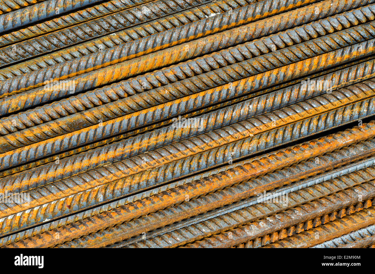 Rusty steel ribbed construction rods. Rebar background. Stock Photo