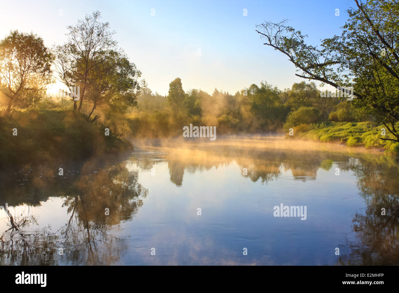 rural landscape with sunrise over the river and fog Stock Photo - Alamy