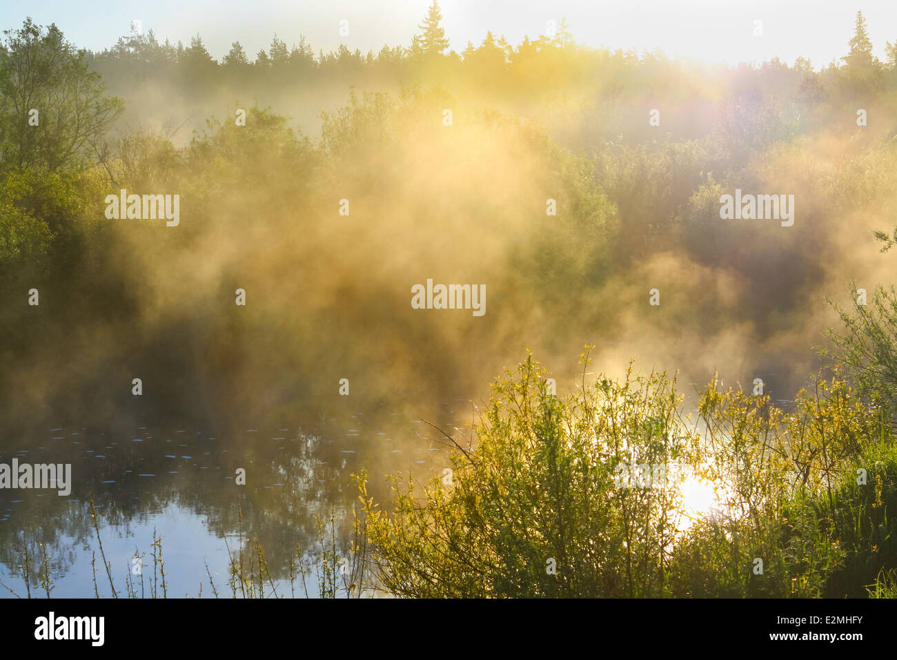 rural landscape with sunrise over the river and fog Stock Photo - Alamy
