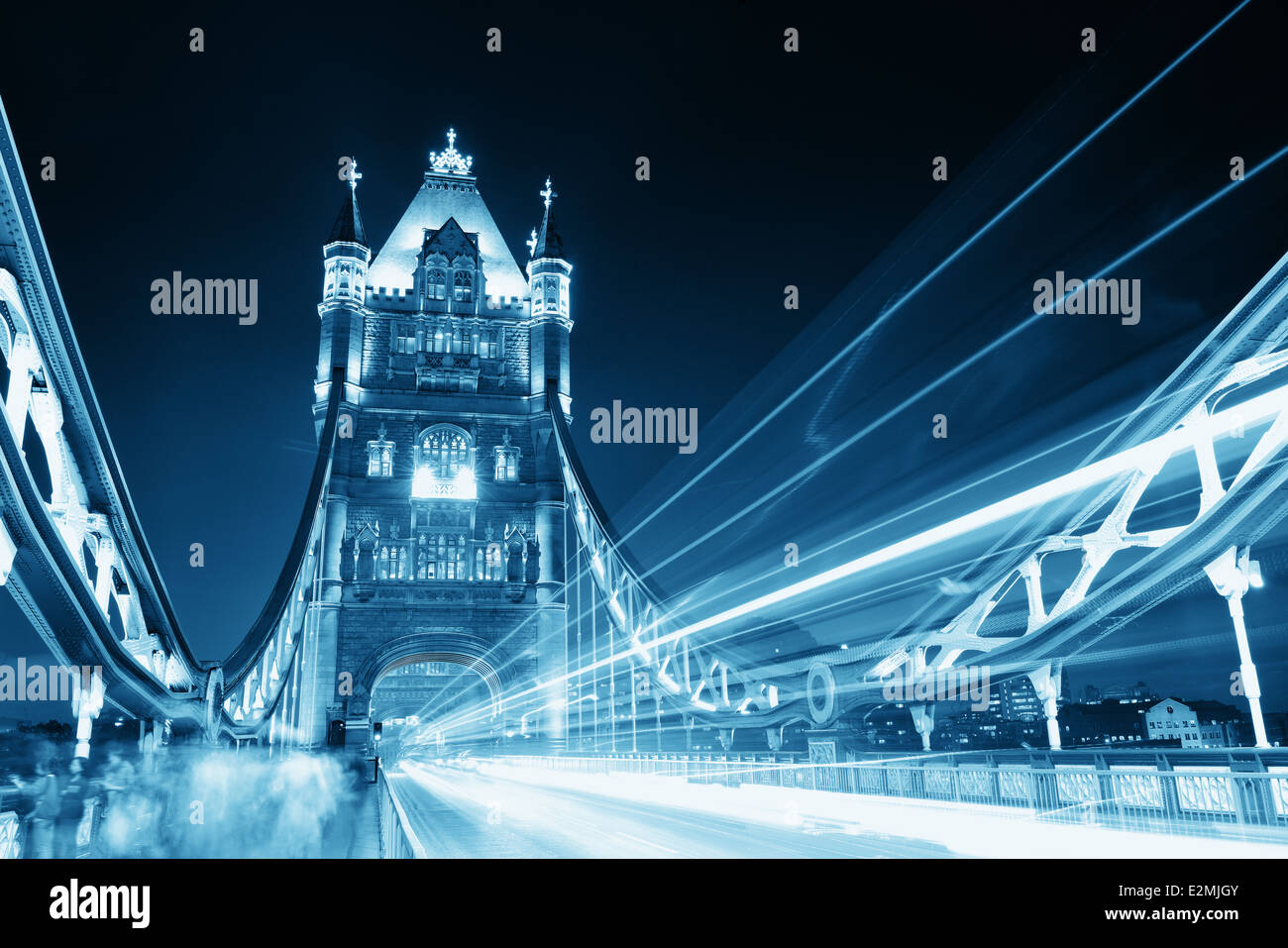 Tower Bridge in London with busy traffic at night Stock Photo - Alamy