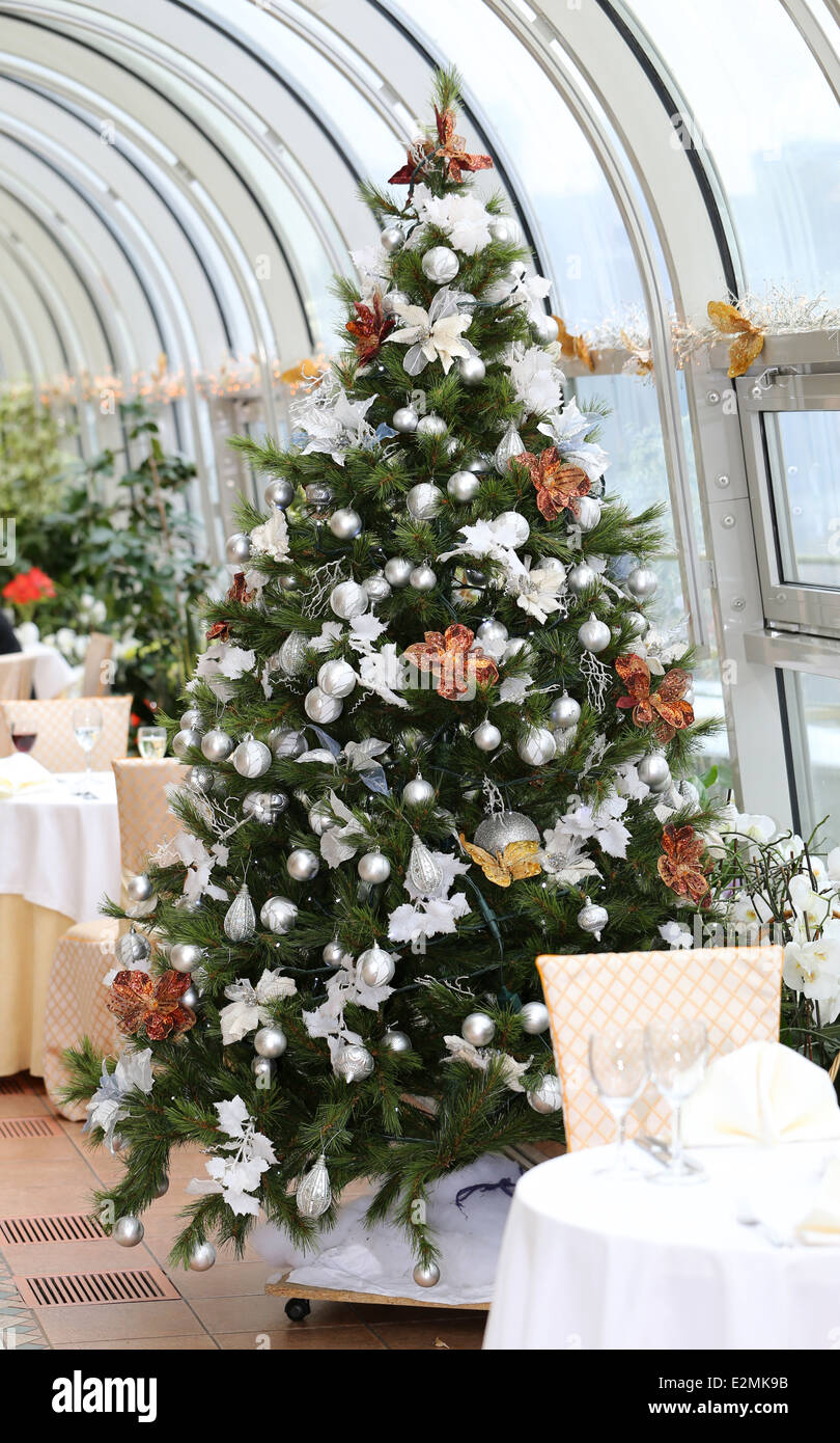 beautiful festive Christmas tree in the restaurant Stock Photo