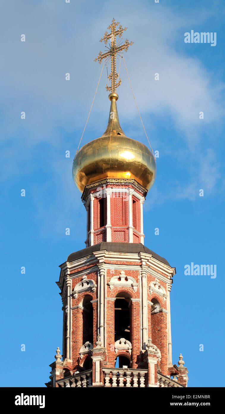 Beautiful Baroque bell tower on a background of blue sky Stock Photo