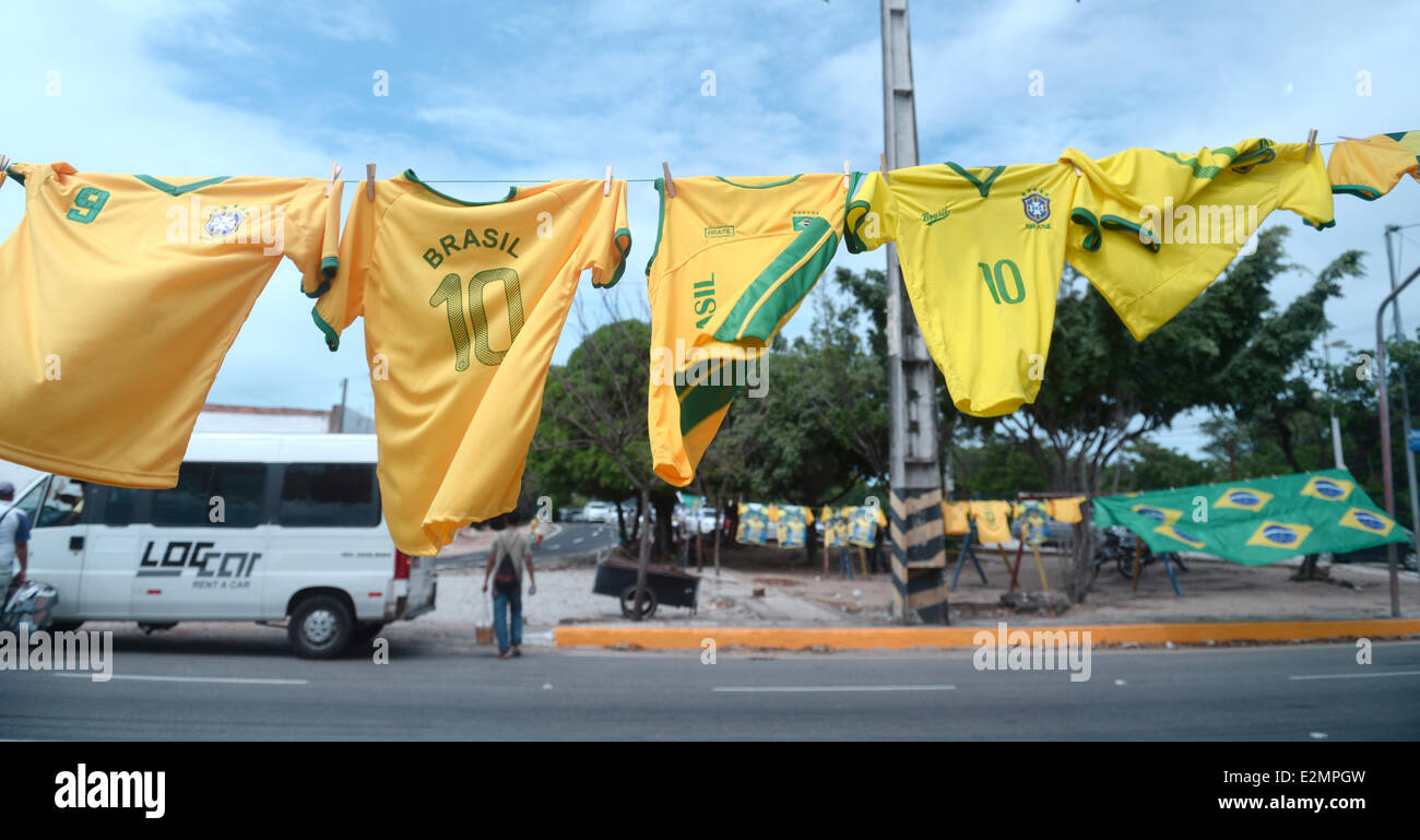 Fortaleza, Brazil. 20th June, 2014. Jerseys of the Brazilian national soccer team with the numbers nine and ten are hung up on a line at the side of a street in Fortaleza, Brazil, 20 June 2014. The FIFA World Cup will take place in Brazil from 12 June to 13 July 2014. Photo: Marcus Brandt/dpa/Alamy Live News Stock Photo