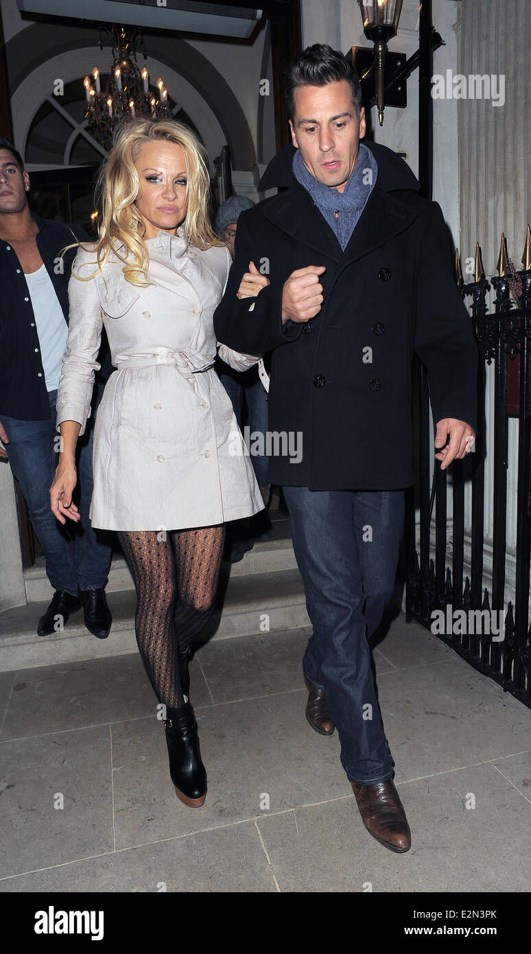 Pamela Anderson and her 'Dancing On Ice' partner Matt Evers leave Les  Ambassadeurs Club after spending around 4 hours inside the Stock Photo -  Alamy