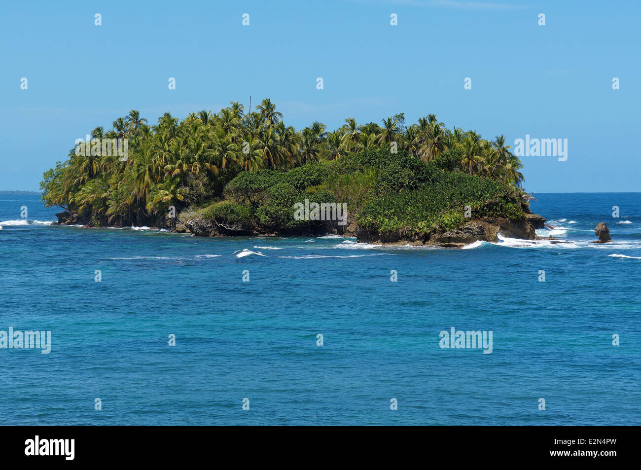 Untouched tropical island with lush vegetation in the Caribbean sea, Bocas del Toro archipelago, Panama Stock Photo