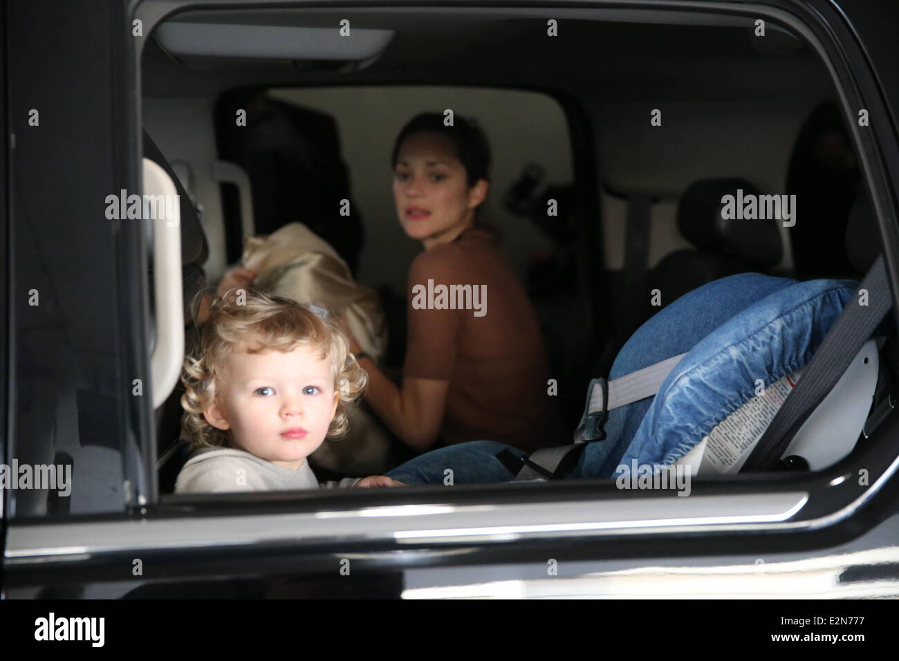 Marion Cotillard, Guillaume Canet and their son Marcel attend the Gucci  Paris Masters 2012 at Paris Nord Villepinte Featuring: Marion Cotillard, Marcel Where: Villepinte, France When: 30 Nov 2012 Stock Photo - Alamy