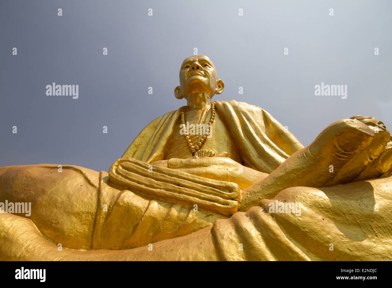 Buddha statue with blue sky background Stock Photo - Alamy