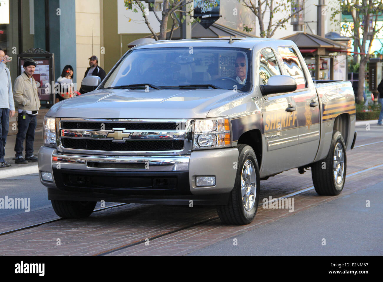 Arnold Schwarzenegger drives a Sheriff truck to The Grove to promote his new film 'The Last Stand' on entertainment news show 'Extra'  Featuring: Arnold Schwarzenegger Where: Los Angeles, California, United States When: 14 Jan 2013 Stock Photo