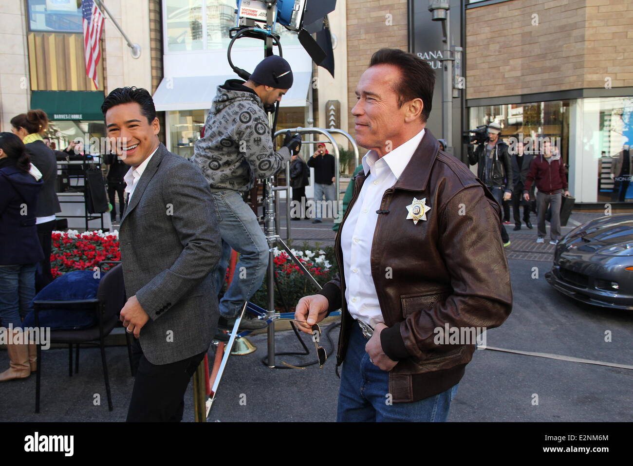 Arnold Schwarzenegger drives a Sheriff truck to The Grove to promote his new film 'The Last Stand' on entertainment news show 'Extra'  Featuring: Arnold Schwarzenegger,Mario Lopez Where: Los Angeles, California, United States When: 14 Jan 2013vid Durocher/WENN.com Stock Photo