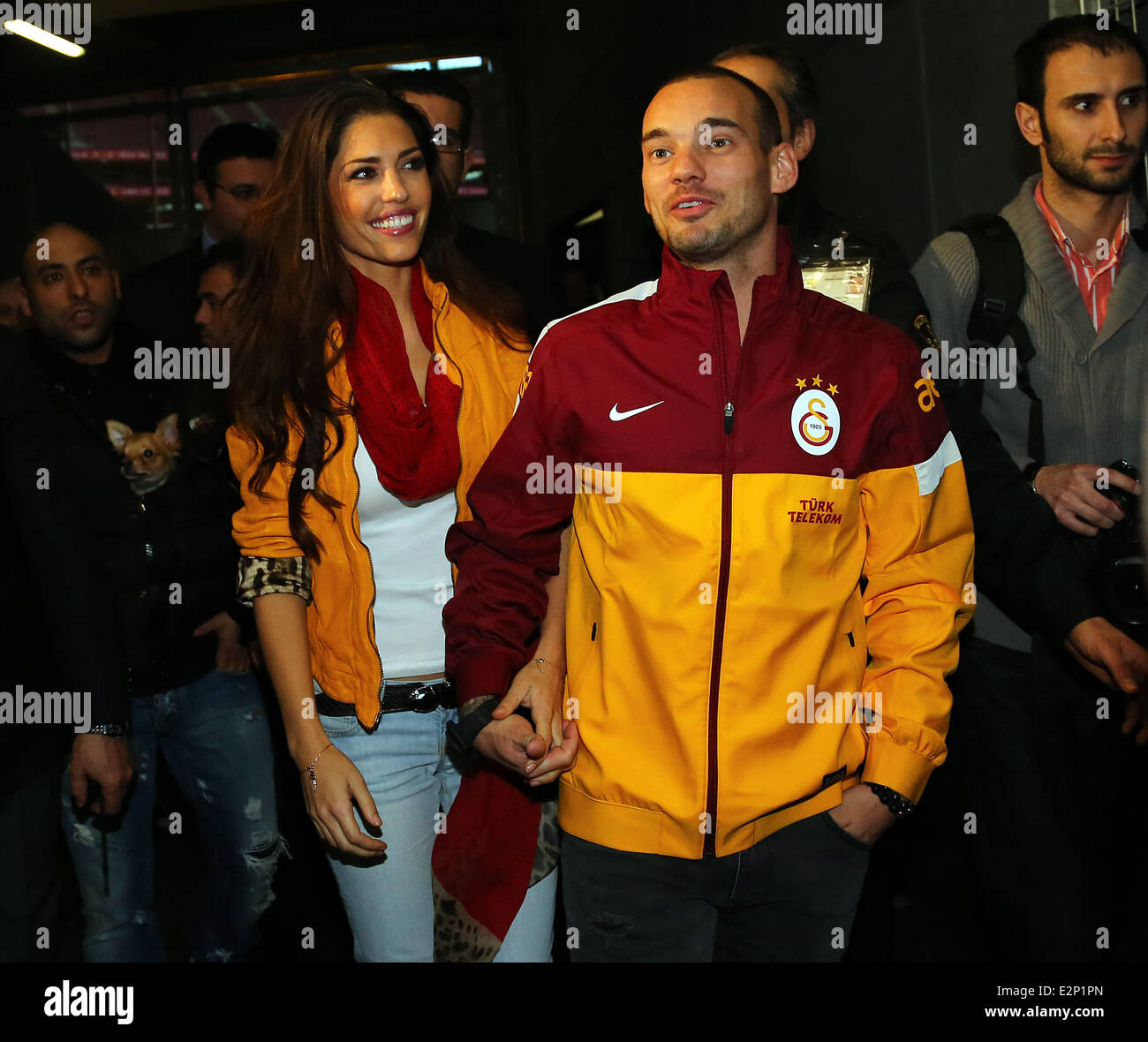 Dutch Footballler Wesley Sneijder attends a press conference after a health check in Istanbul. Sneijder has signed 3.5 years contract with Galatasaray Football club.  Featuring: Wesley Sneijder,Yolanthe Cabau van Kasbergen Where: Istanbul, Turkey When: 22 Jan 2013 Stock Photo