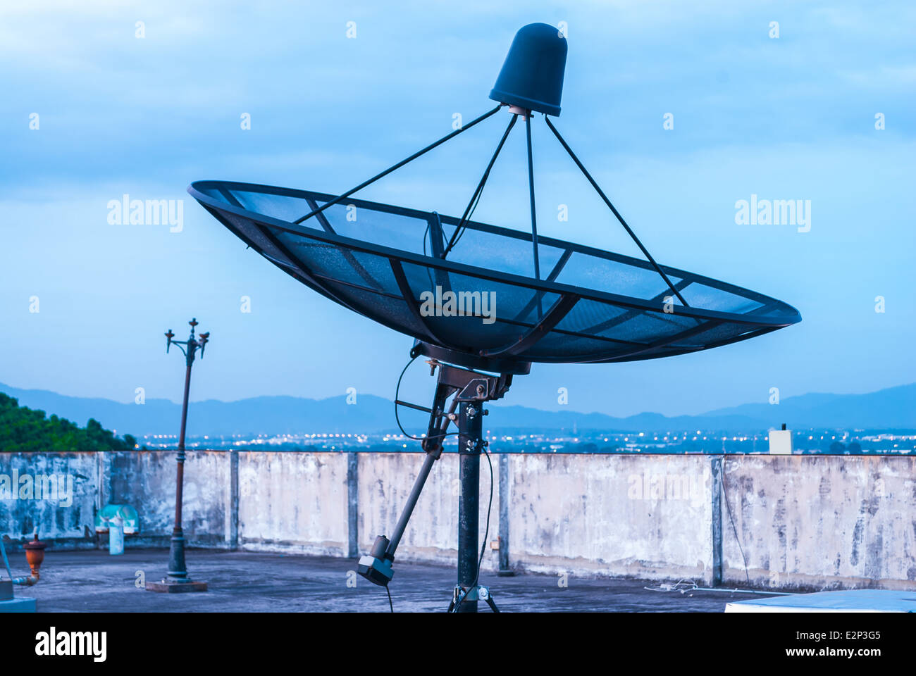 Satellite Dish on the Rooftop. Stock Photo