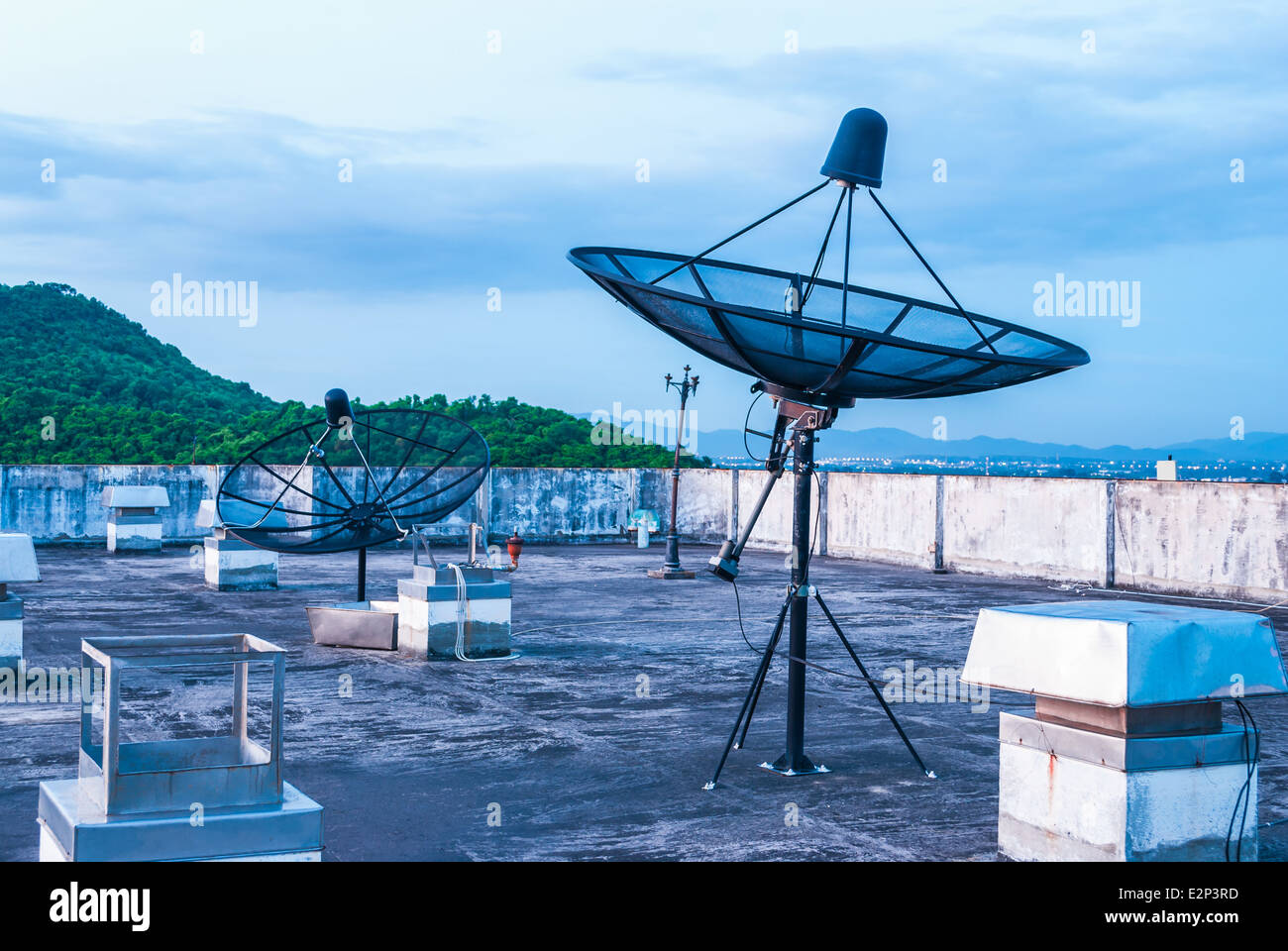 Satellite Dishes on the Rooftop. Stock Photo