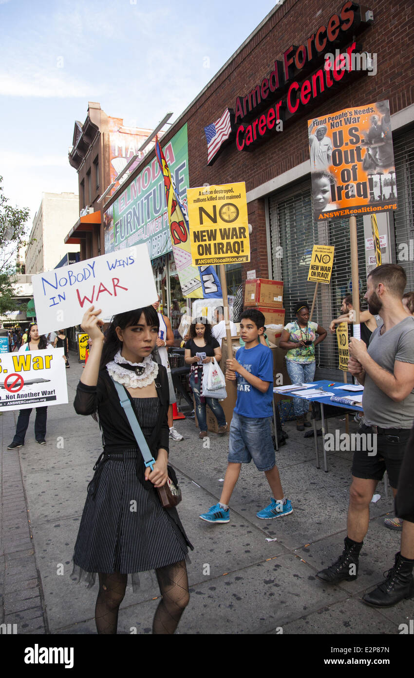 NY, NY, USA. 20th June, 2014. A coalition of groups picket in front of a military career center in Harlem, NYC.  Poor neighborhoods like Harlem have always been fertile ground to recruit soldiers for the US military. Credit:  David Grossman/Alamy Live News Stock Photo