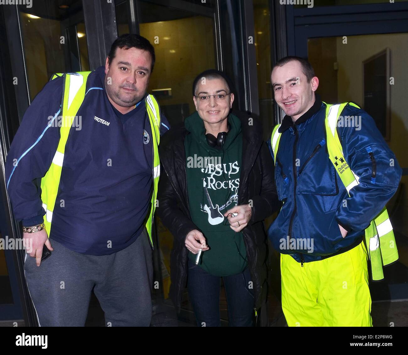 Sinead O'Connor smoking outside Today FM studios where she was a guest on  the 'Tony Fenton Show.' O'Connor also posed with two Dublin Corporation  Litter Wardens Featuring: Sinead O'Connor with Litter Men