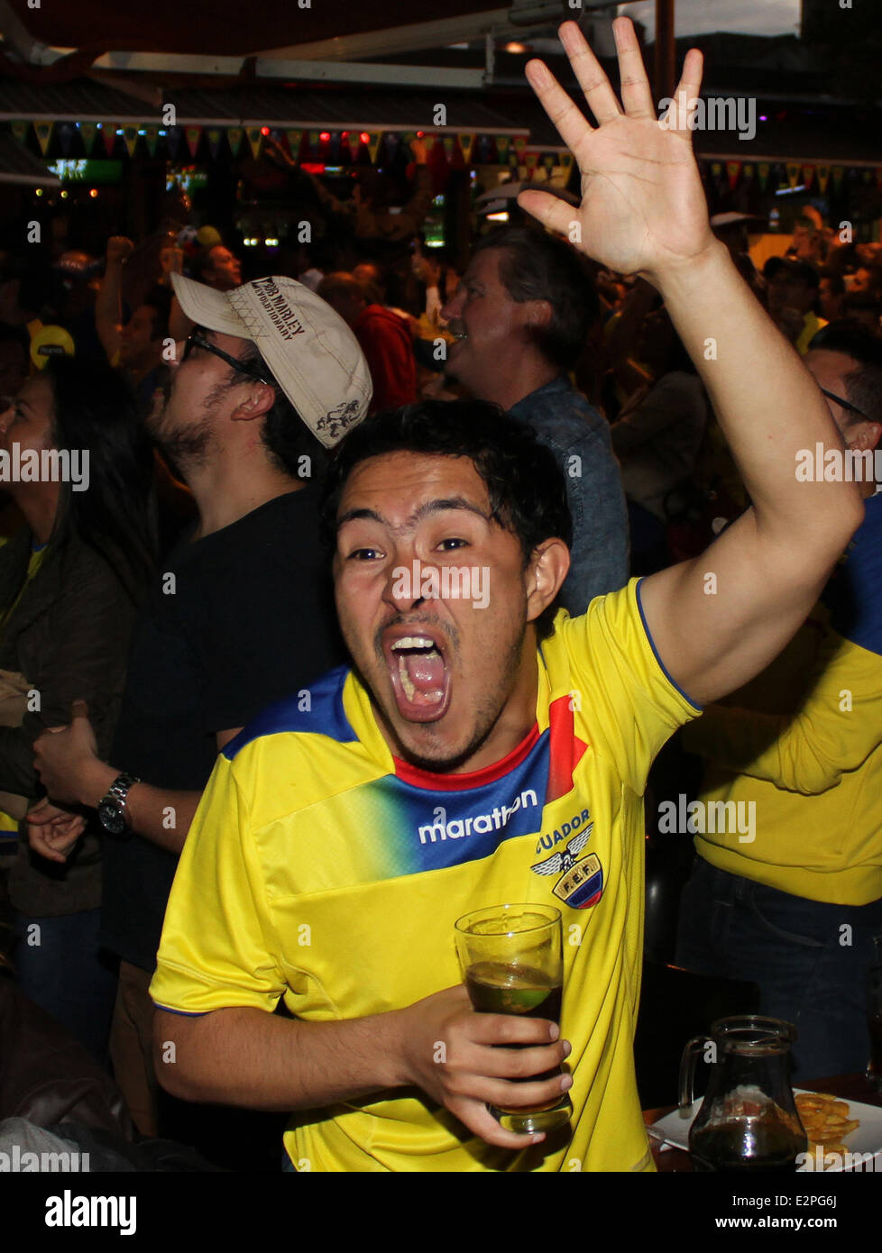Quito, Ecuador. 20th June, 2014. An Ecuadorian fan takes part in the celebration of the victory of the Ecuador National Soccer Team against Honduras in the Group E match of the second round of 2014 FIFA World Cup, at the Foch Square, in Quito, capital of Ecuador, on June 20, 2014. Credit:  Santiago Armas/Xinhua/Alamy Live News Stock Photo