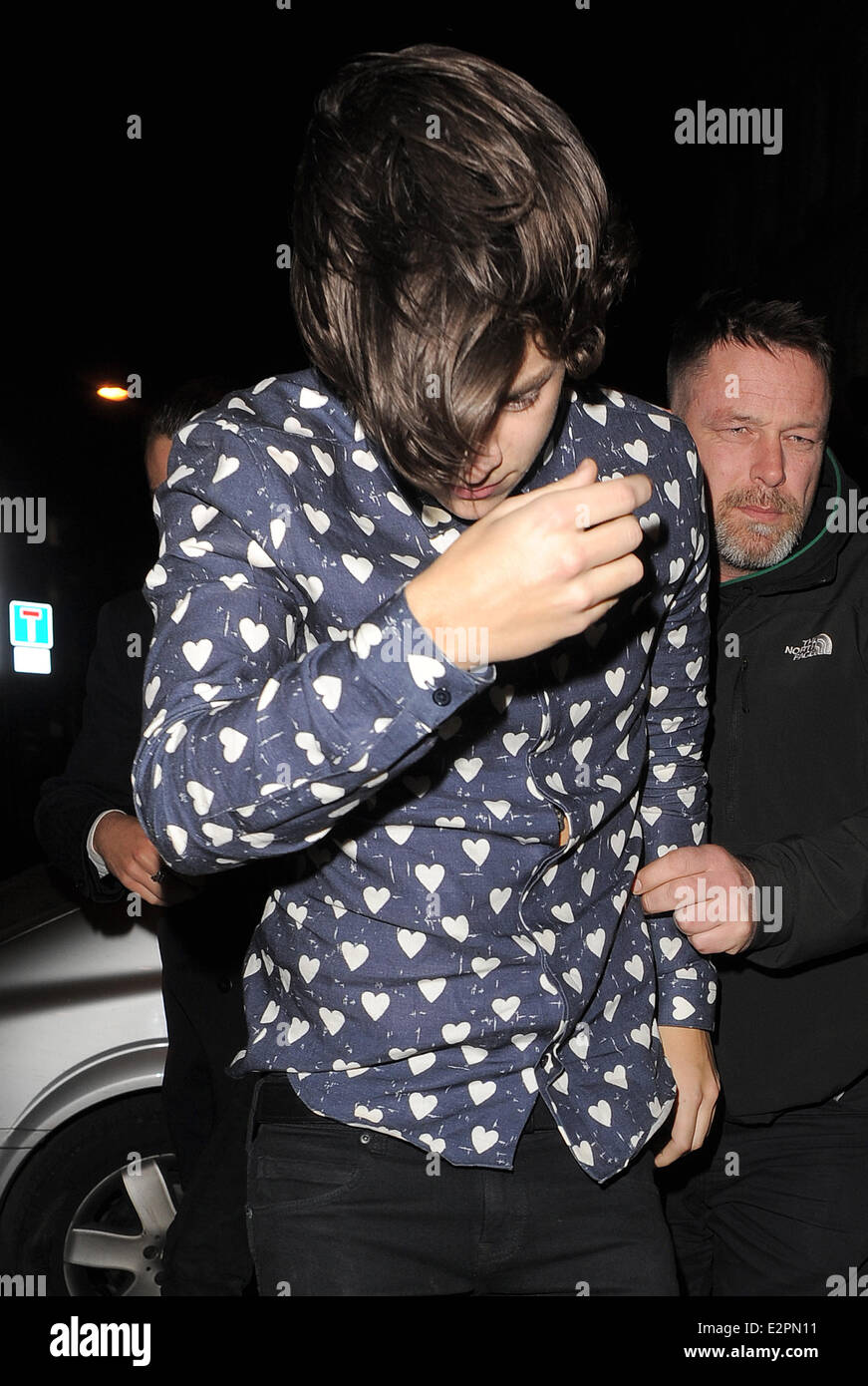 Harry Styles appears rather unsteady on his feet, as he arrives at a  friends house in East London, with a female companion, following a night  out in Dalston, where Harry went to