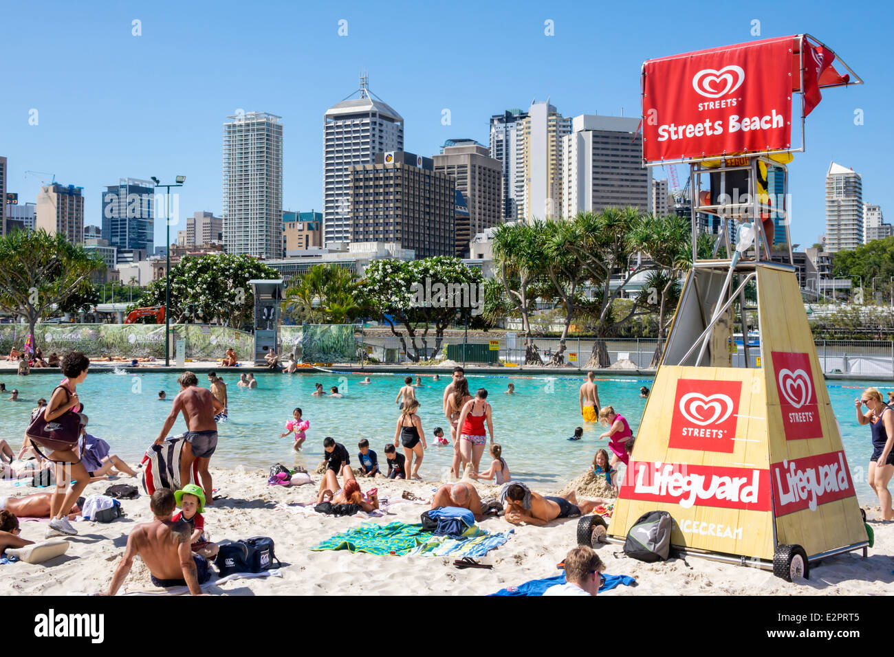 Brisbane Australia,Queensland Southbank Parklands,Streets Beach,sunbathers,sand,water CBD,city skyline cityscape,skyscrapers,buildings,visitors travel Stock Photo