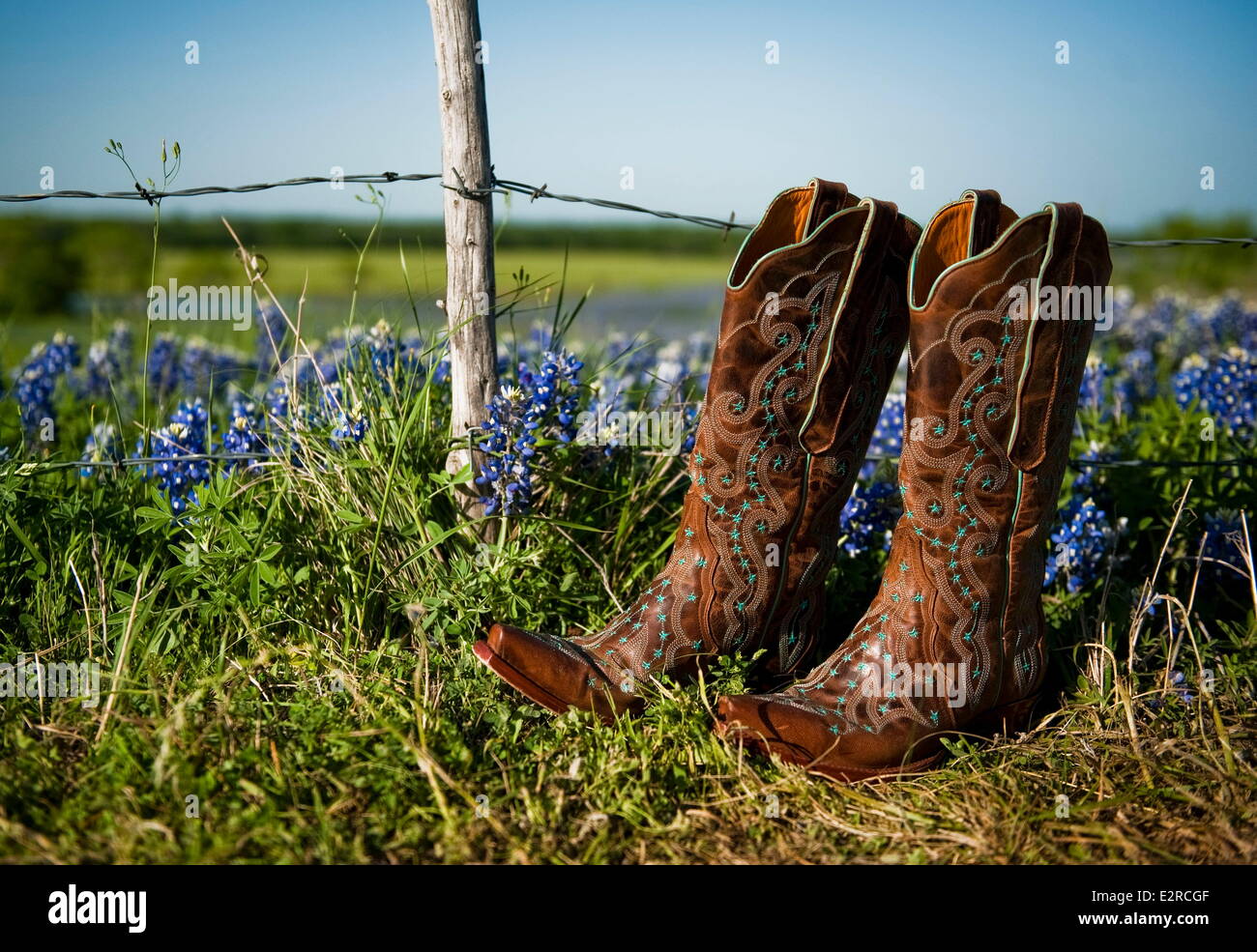 Ennis, Texas, USA. 24th Apr, 2014. Cowboy boots rest on the side of