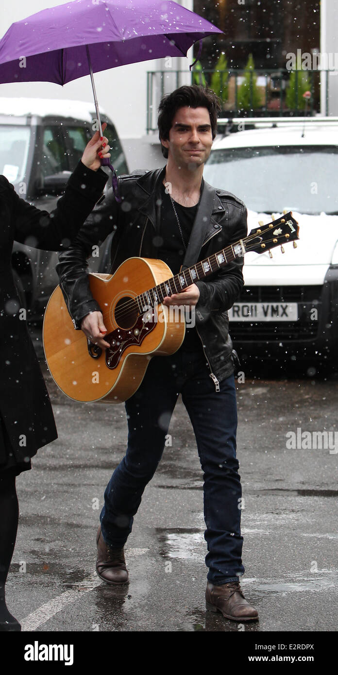 Kelly Jones of 'Stereophonics' and radio DJ Chris Evans seen busking  outside Abbey Road Studios. The pair sang ''I Saw Her Standing There'', a  song made famous by 'The Beatles' On Monday