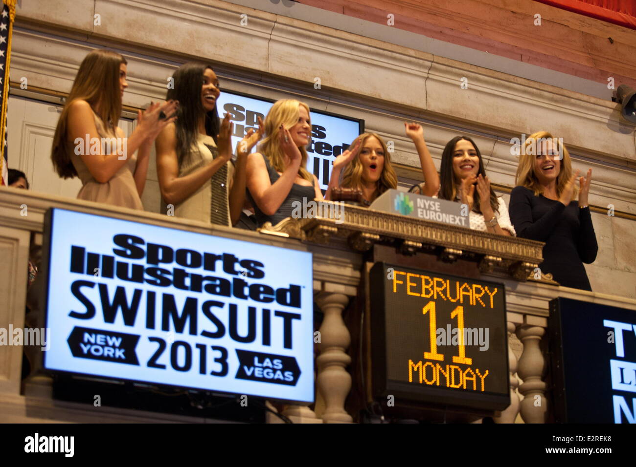 Sports Illustrated swimsuit models celebrate the launch of the 2013 Swimsuit Franchise at the New York Stock Exchange (NYSE) by ringing the closing bell  Featuring: Julie Henderson,Adaora Cobb,Kate Bock,Natasha Barnard,Anne V,Jessica Gomes,Jessica Perez W Stock Photo