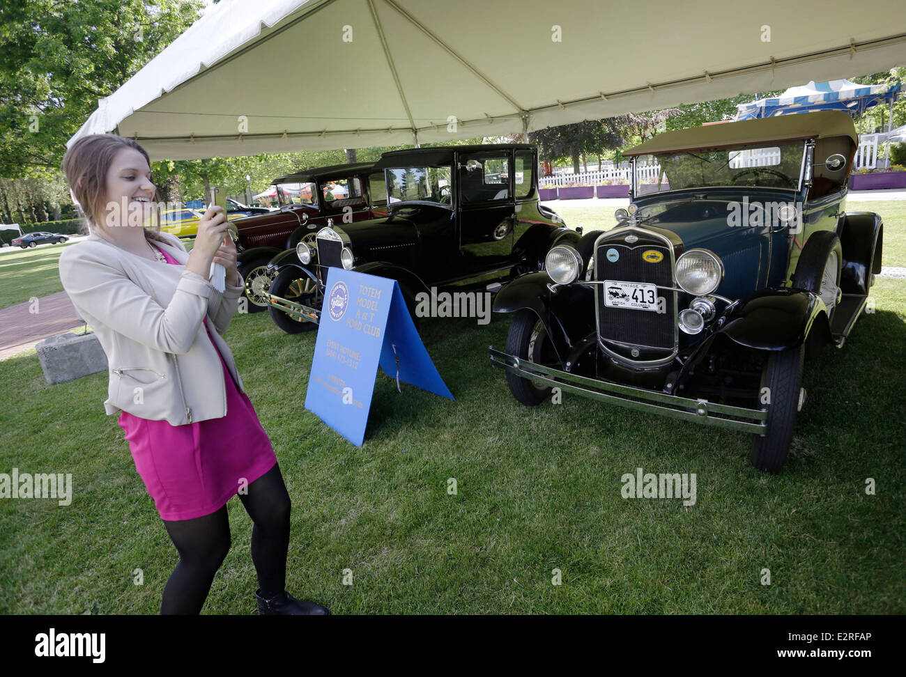 Vancouver, Canada. 20th June, 2014. A visitor takes photos of vintage