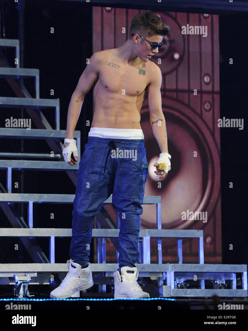 Justin Bieber performs live at the St Pete Times Forum. Bieber excited fans  and took off his tank top during a song Featuring: Justin Bieber Where:  Tampa, Florida, United States When: 25