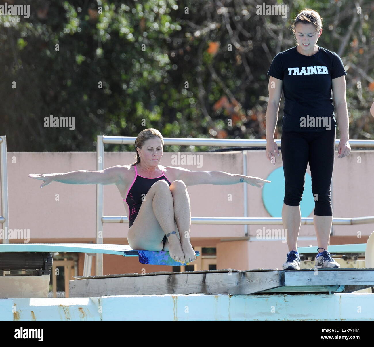Nicole Eggert sports a one piece swimsuit as she continues to improve ...