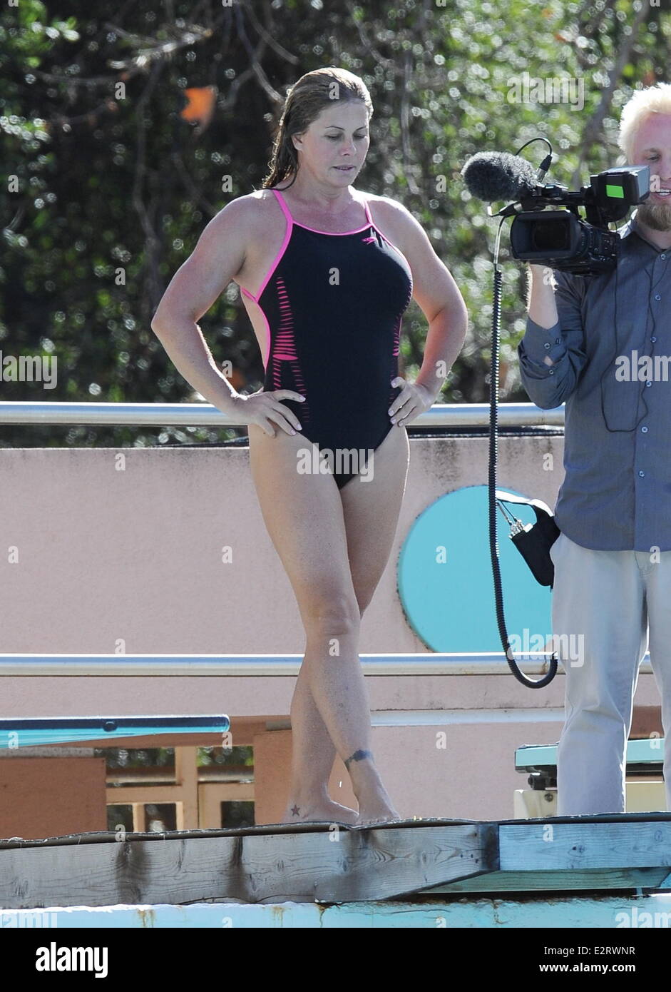 Nicole Eggert sports a one piece swimsuit as she continues to improve ...