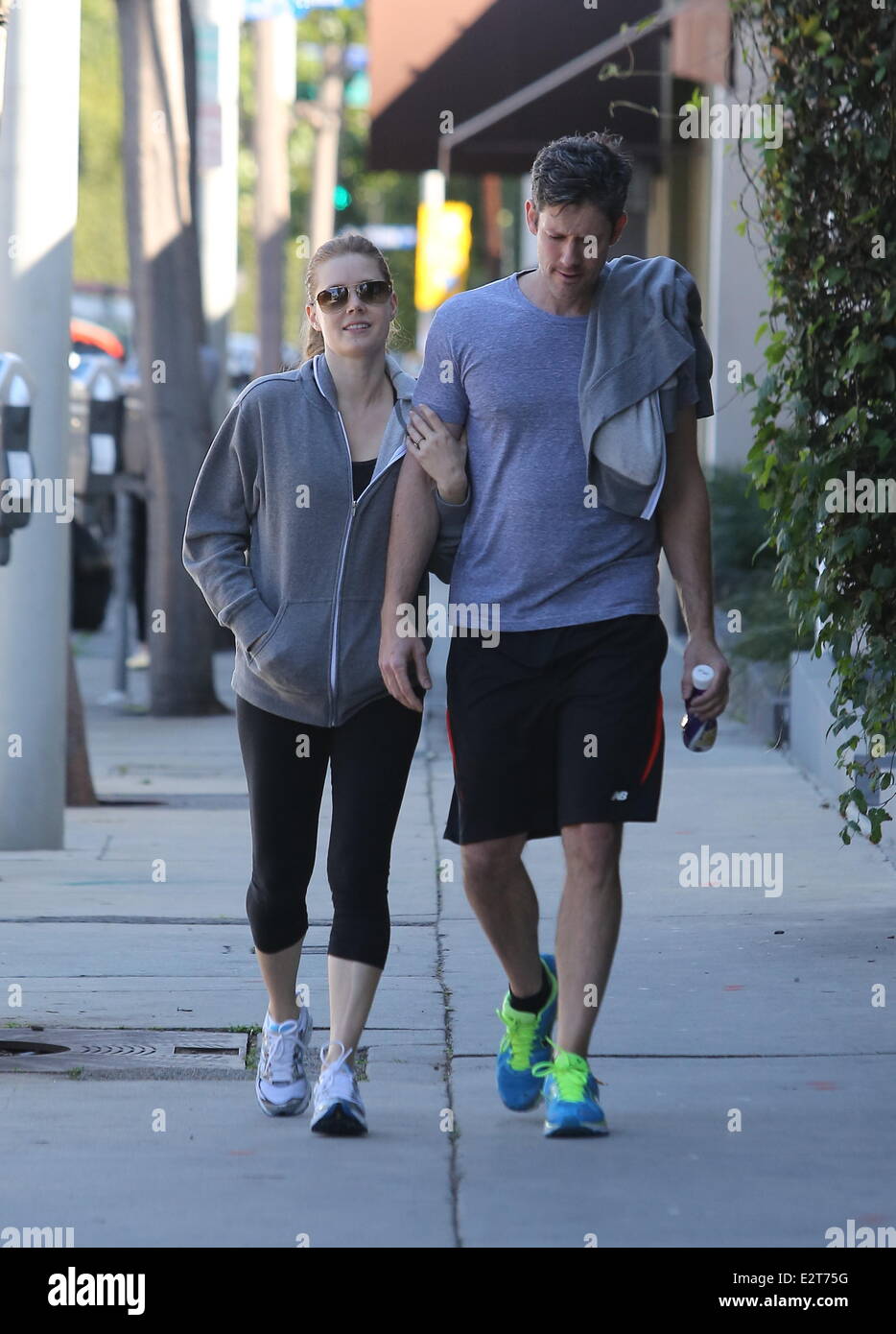 Amy Adams and her partner Darren Le Gallo seen their fitness gear