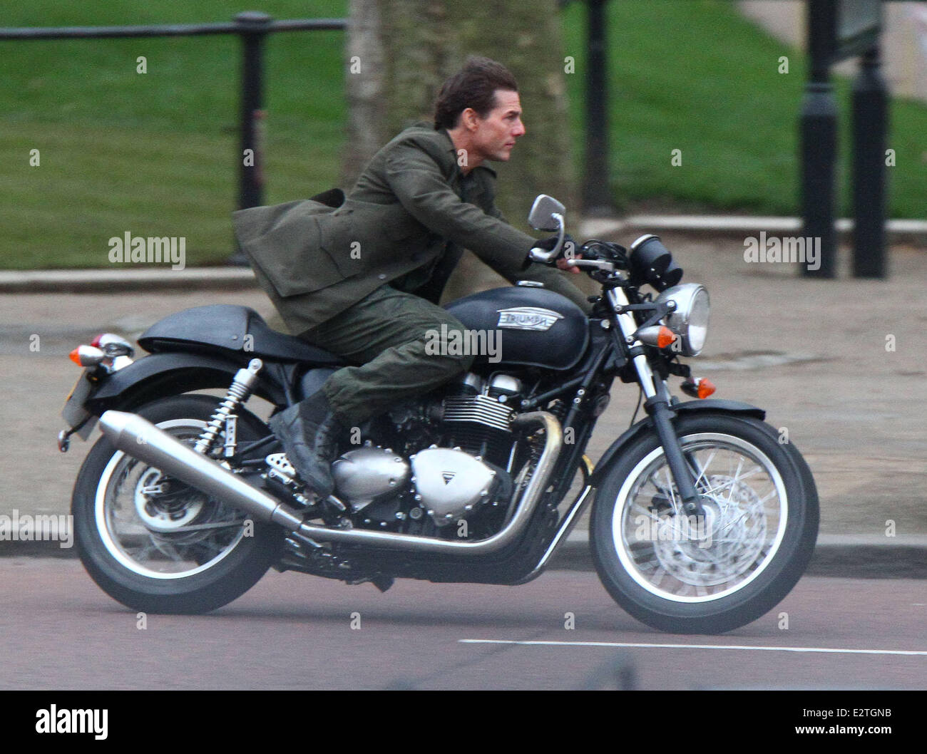 Tom Cruise rides on a Triumph motorbike down the Mall while filming a scene  from his movie 'All You Need is Kill' Featuring: To Stock Photo - Alamy
