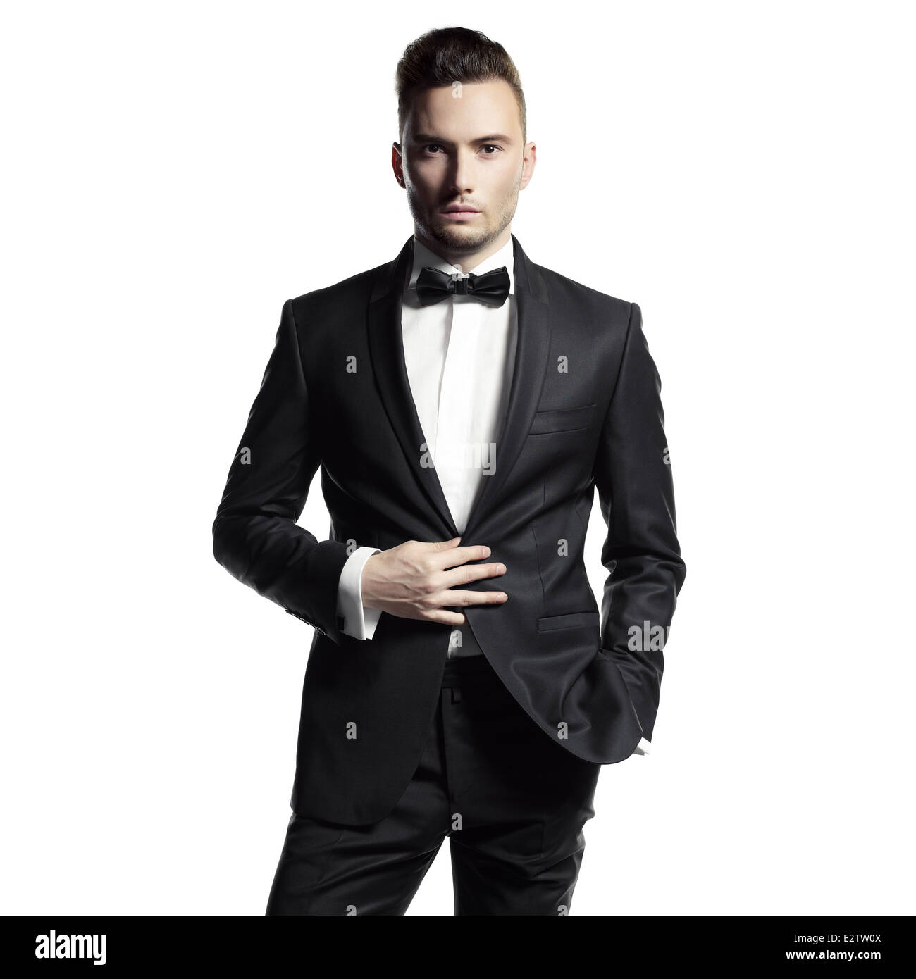 Portrait of handsome stylish man in elegant black suit Stock Photo - Alamy