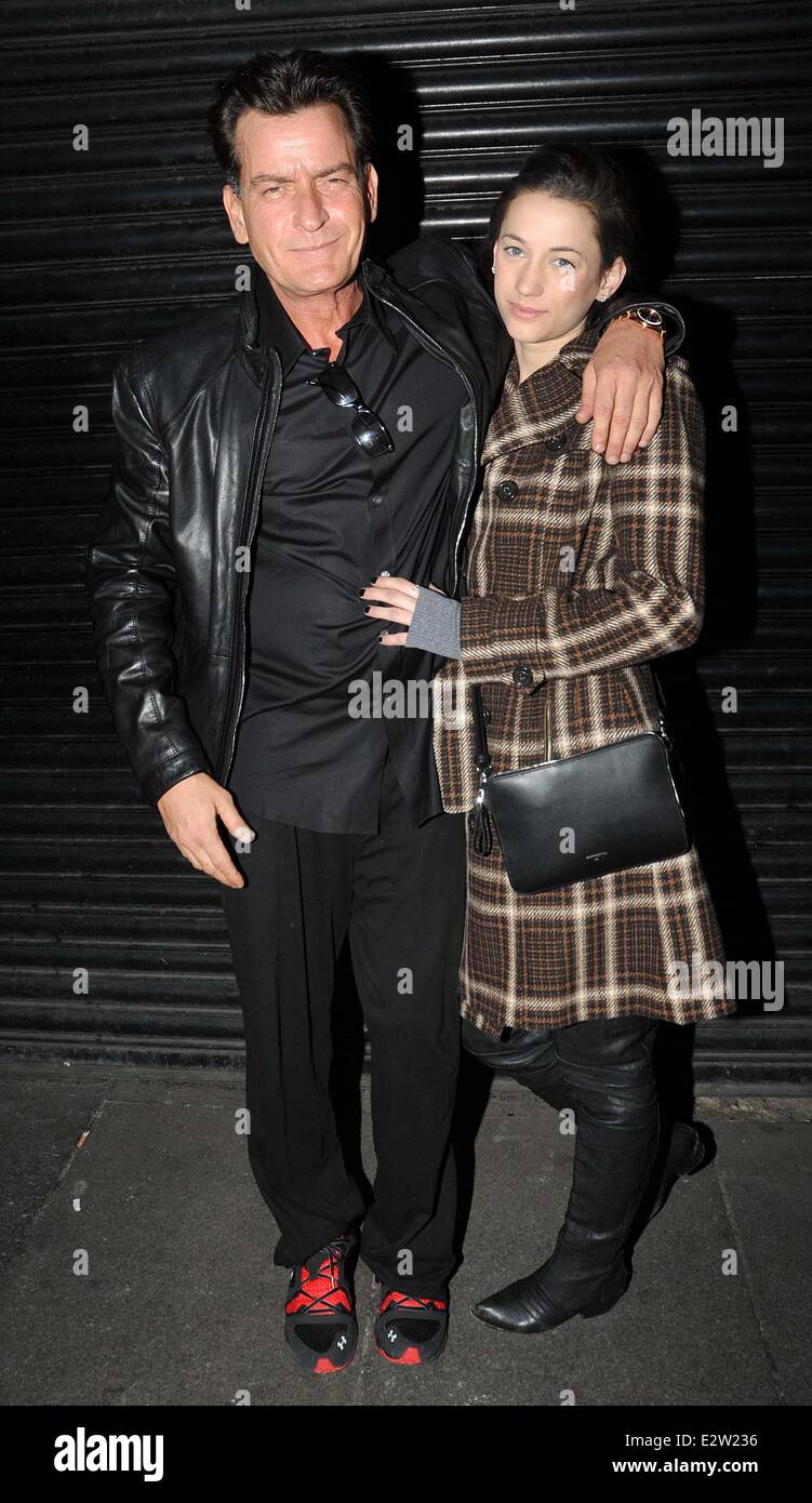 Charlie Sheen poses for the cameras with his girlfriend, Georgia Jones before attending the Slash concert at the Olympia  Featuring: Charlie Sheen,Georgia Jones Where: Dublin, Ireland When: 03 Mar 2013 Stock Photo