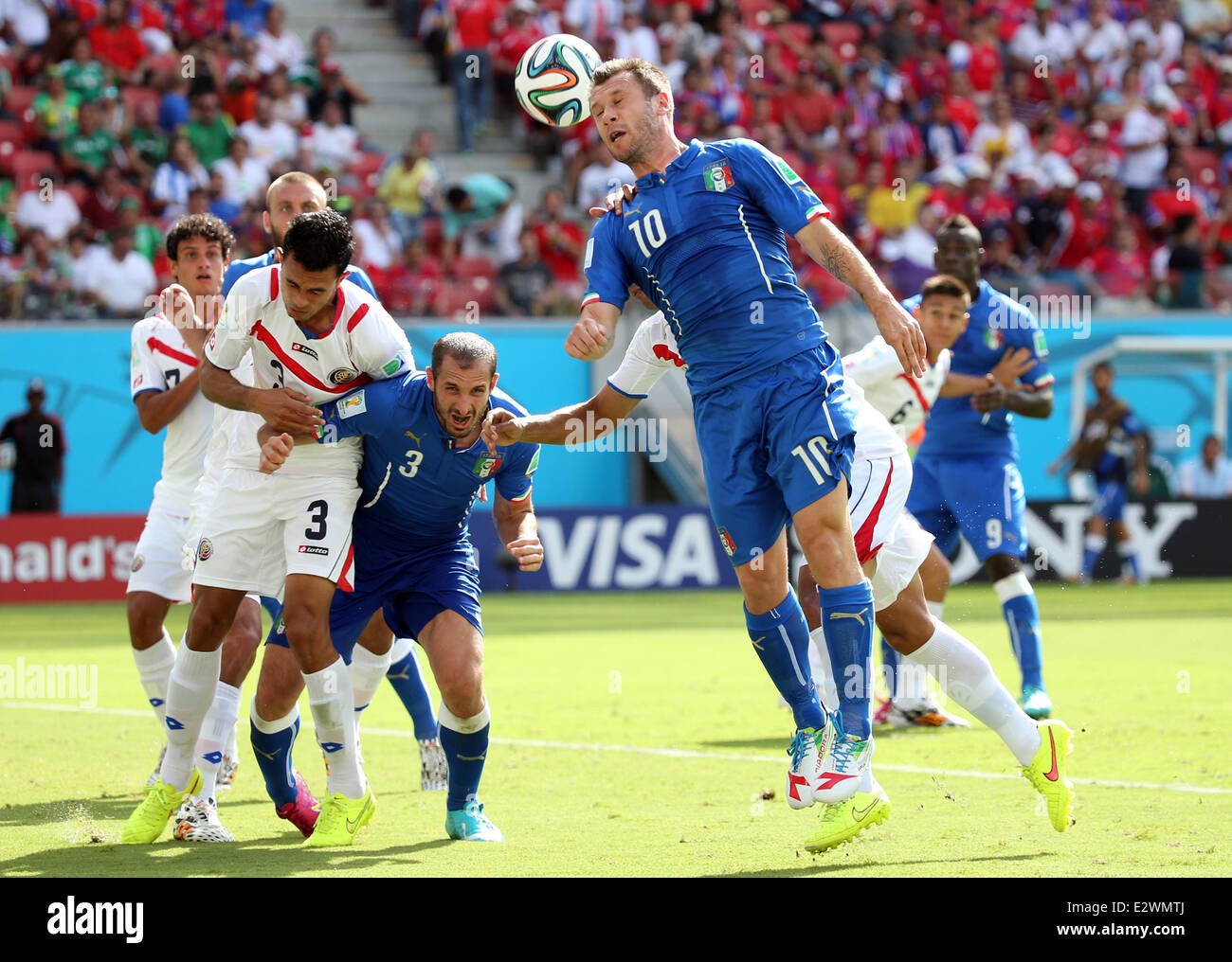 Recife, Brazil. 20th June, 2014. World Cup finals 2014. Group D match, Italy versus Costa Rica. Cassano wins the header against Costa Rica defenders Credit:  Action Plus Sports/Alamy Live News Stock Photo