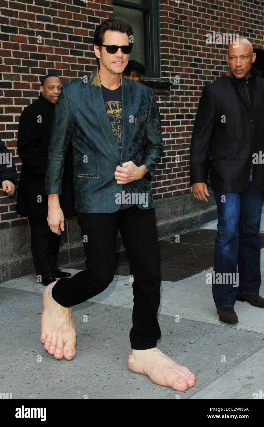 Jim Carrey departs the Ed Sullivan Theater for 'The Late Show with David Letterman' weaing his oversized rubber feet and wings  Featuring: Jim Carrey Where: New York City, New York , United States When: 13 Mar 2013 Stock Photo