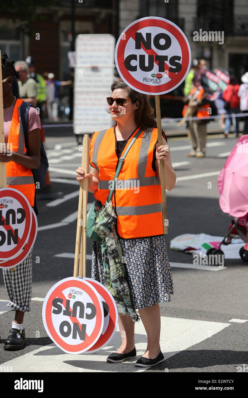 London, UK. 21st June, 2014. Thousands of people have joined a march, on Saturday, June 21, 2014, organised by The People's Assembly, Trade Unions and campaign groups under the slogan of 'No More Austerity: Demand the Alternative' have marched through central London from outside BBC headquarters to the Houses of Parliament where a rally was held. Demonstrators marched with banners and placards making their voices heard regarding many different issues including austerity, tax and the National Health Service (NHS). Credit:  Christopher Middleton/Alamy Live News Stock Photo