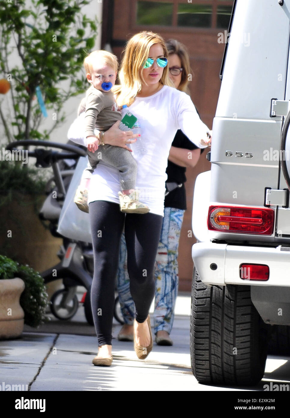 Hilary Duff is seen leaving her mother's house with her son Luca in