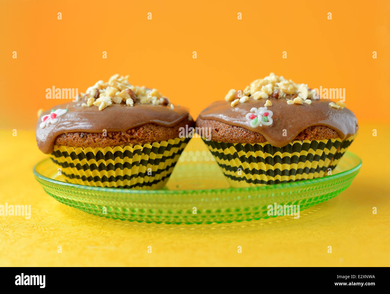 Homemade honey cake, decorated with nuts Stock Photo