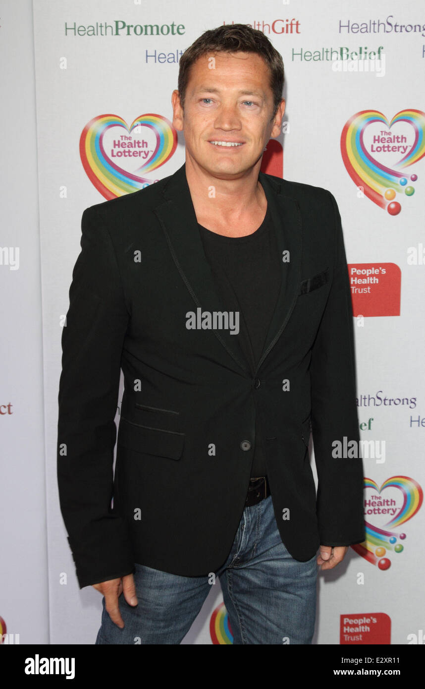 The Health Lottery reception with Simon Cowell held at Claridge's - Arrivals  Featuring: Sid Owen Where: London, United Kingdom When: 28 Mar 2013 Stock Photo