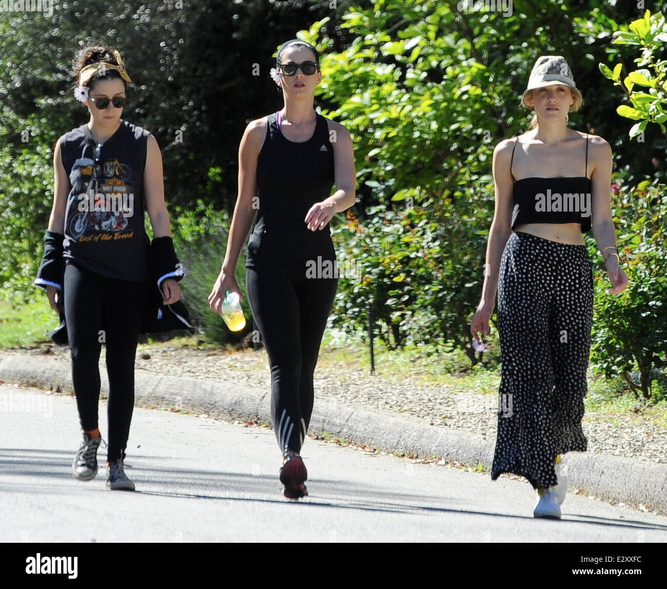 Katy Perry bumps into 'Glee' star Jane Lynch, while hiking with friends on a trail in Studio City. Despite just recently breaking up with boyfriend John Mayer, Perry, who was spotted with a flower tucked behind her ear, was in good spirits  Featuring: Kat Stock Photo