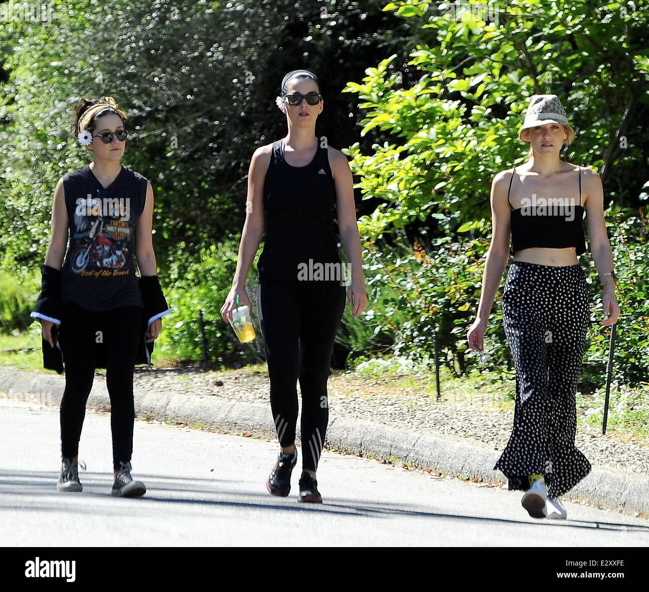 Katy Perry bumps into 'Glee' star Jane Lynch, while hiking with friends on a trail in Studio City. Despite just recently breaking up with boyfriend John Mayer, Perry, who was spotted with a flower tucked behind her ear, was in good spirits  Featuring: Kat Stock Photo