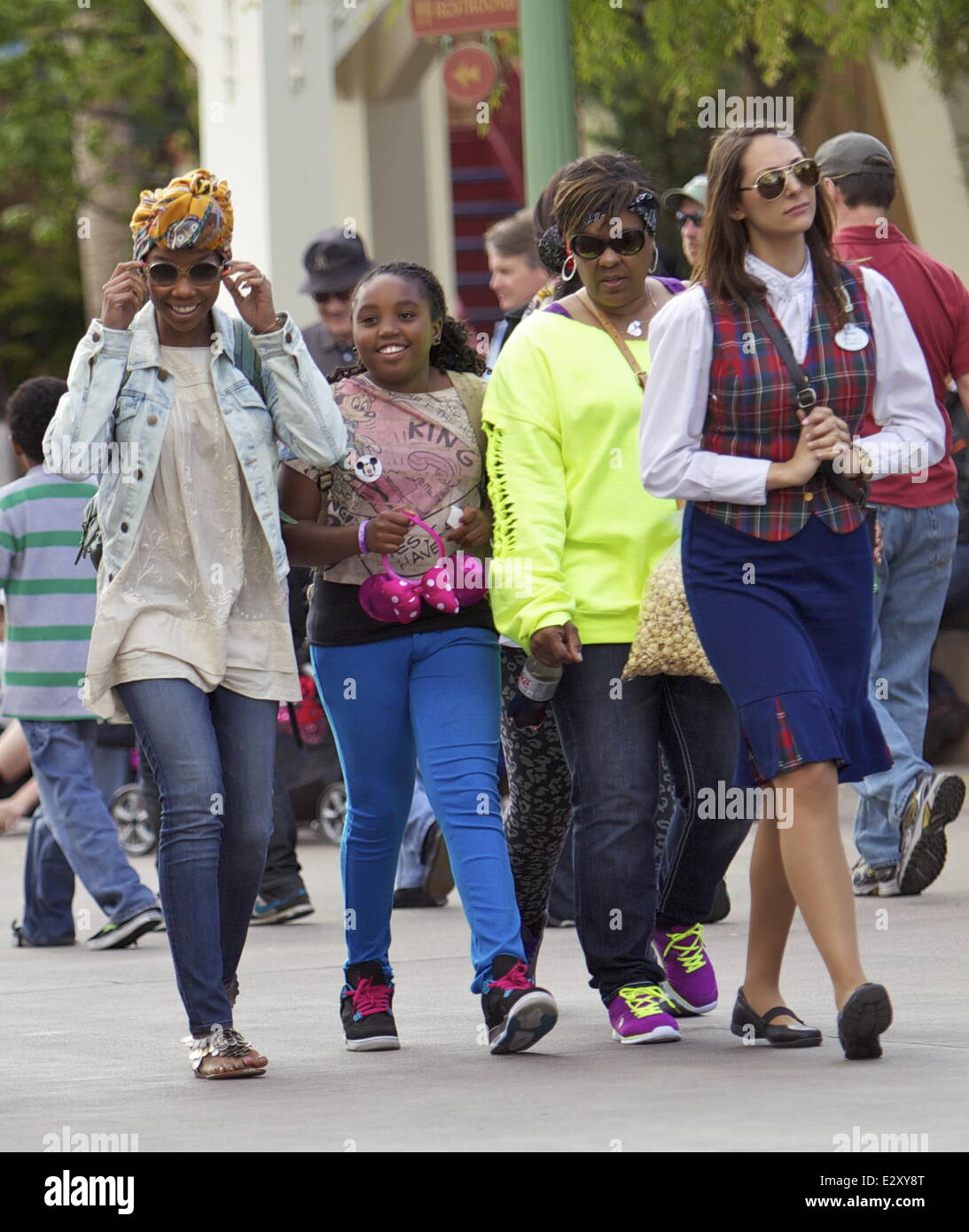 Brandy Norwood walks with her daughter through Paradise Pier at Disney's California Adventure