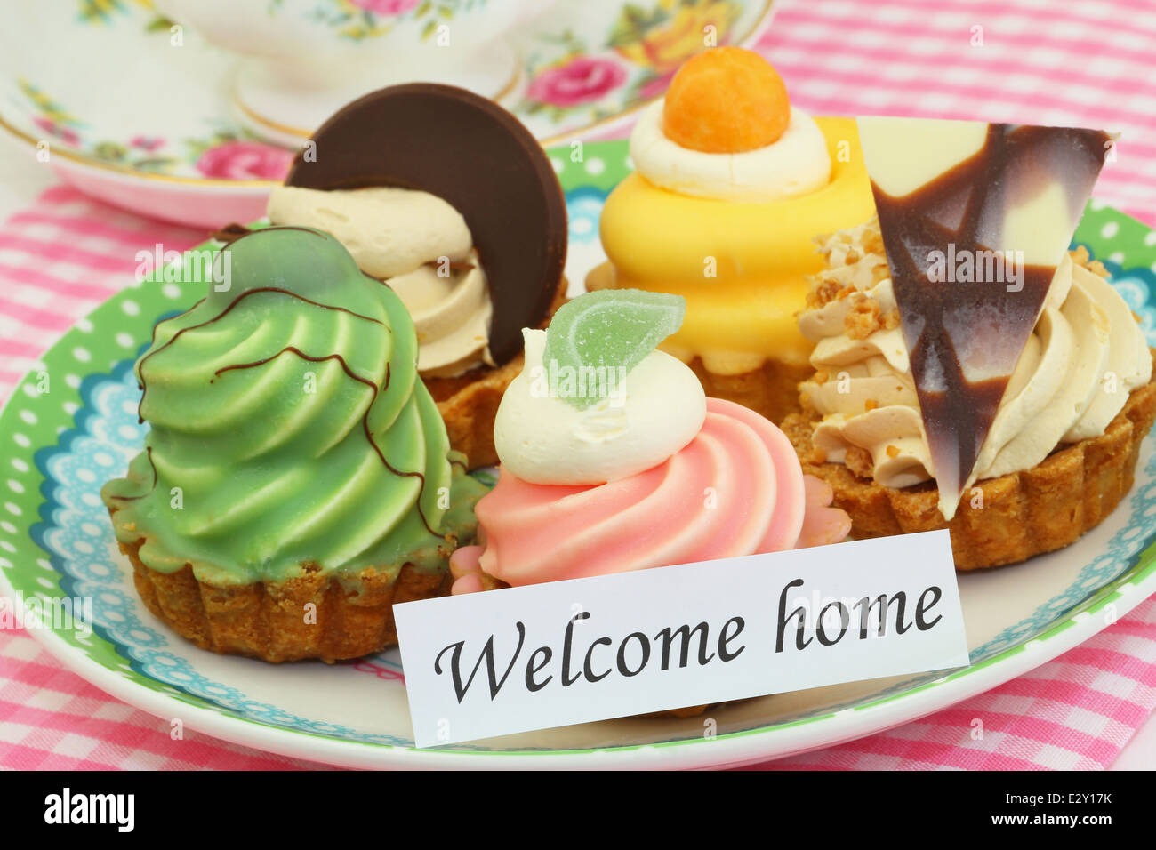 Welcome card with colorful cream cakes Stock Photo