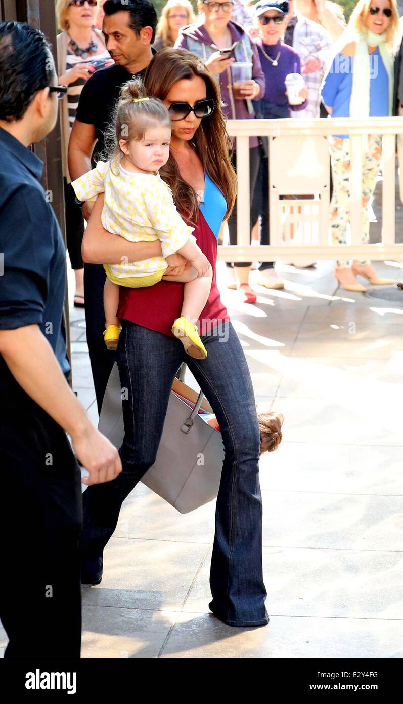 Victoria Beckham seen with her children exiting American Girl Place at