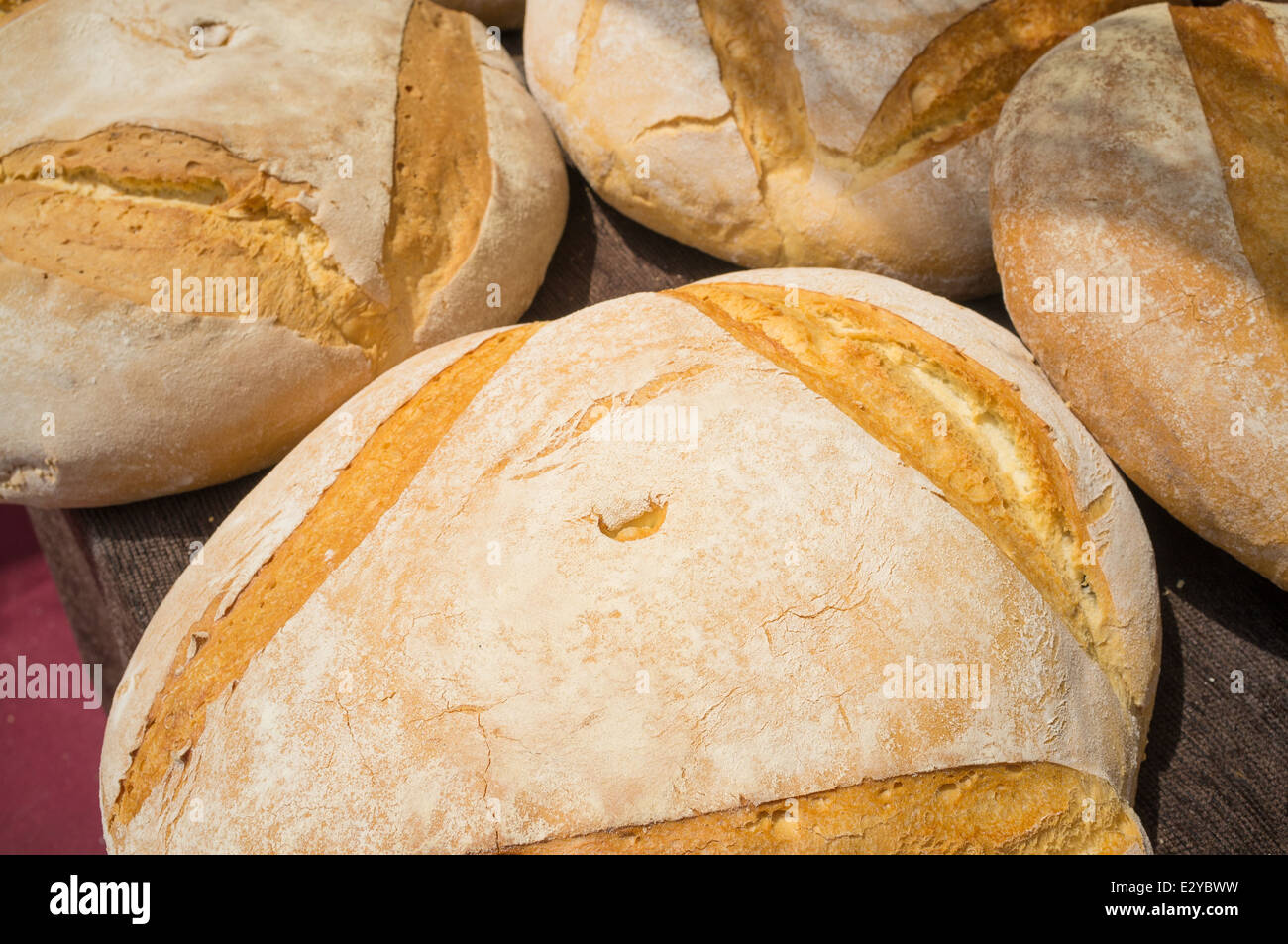 Several fresh loaves of bread on a street market stall Stock Photo Alamy