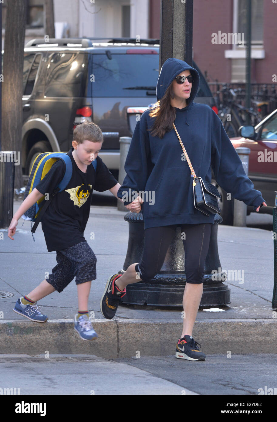 Liv Tyler takes her son Milo to school while wearing an oversized sweat