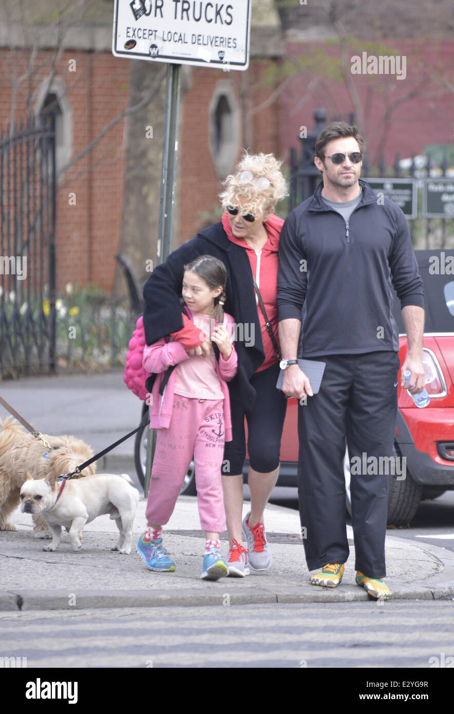 Hugh Jackman and wife Deborra-Lee Furness walk their daughter Ava Jackman to school  Featuring: Hugh Jackman,Ava Eliot Jackman,Deborra-Lee Furness Where: New York, NY, United States When: 11 Apr 2013 Stock Photo